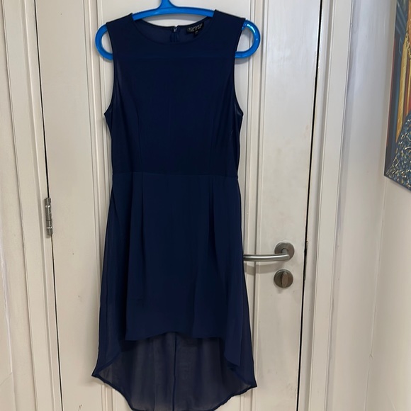 Topshop Dresses & Skirts - NWOT Topshop Asymmetrical Hemline , sleeveless dress with slip & back zip!UK 12